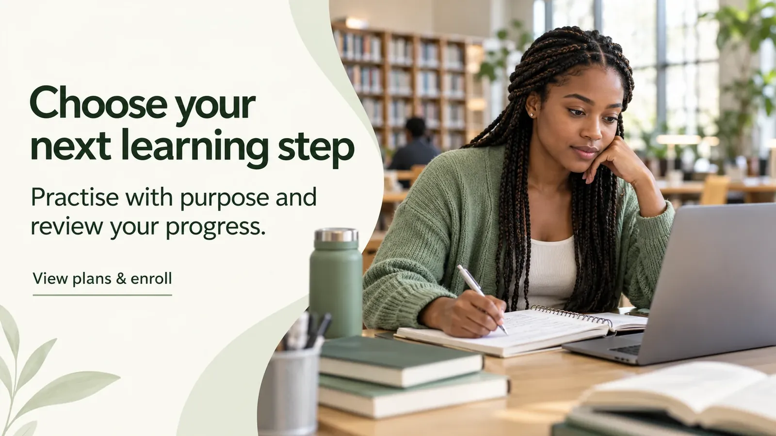Healthcare student planning the next learning step beside a laptop