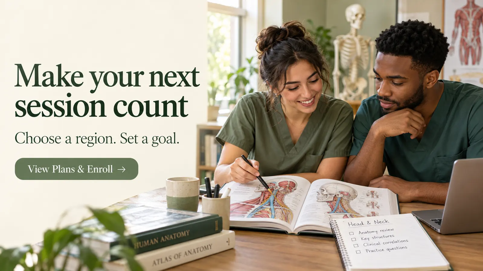 Two adult healthcare learners planning regional anatomy revision with an atlas